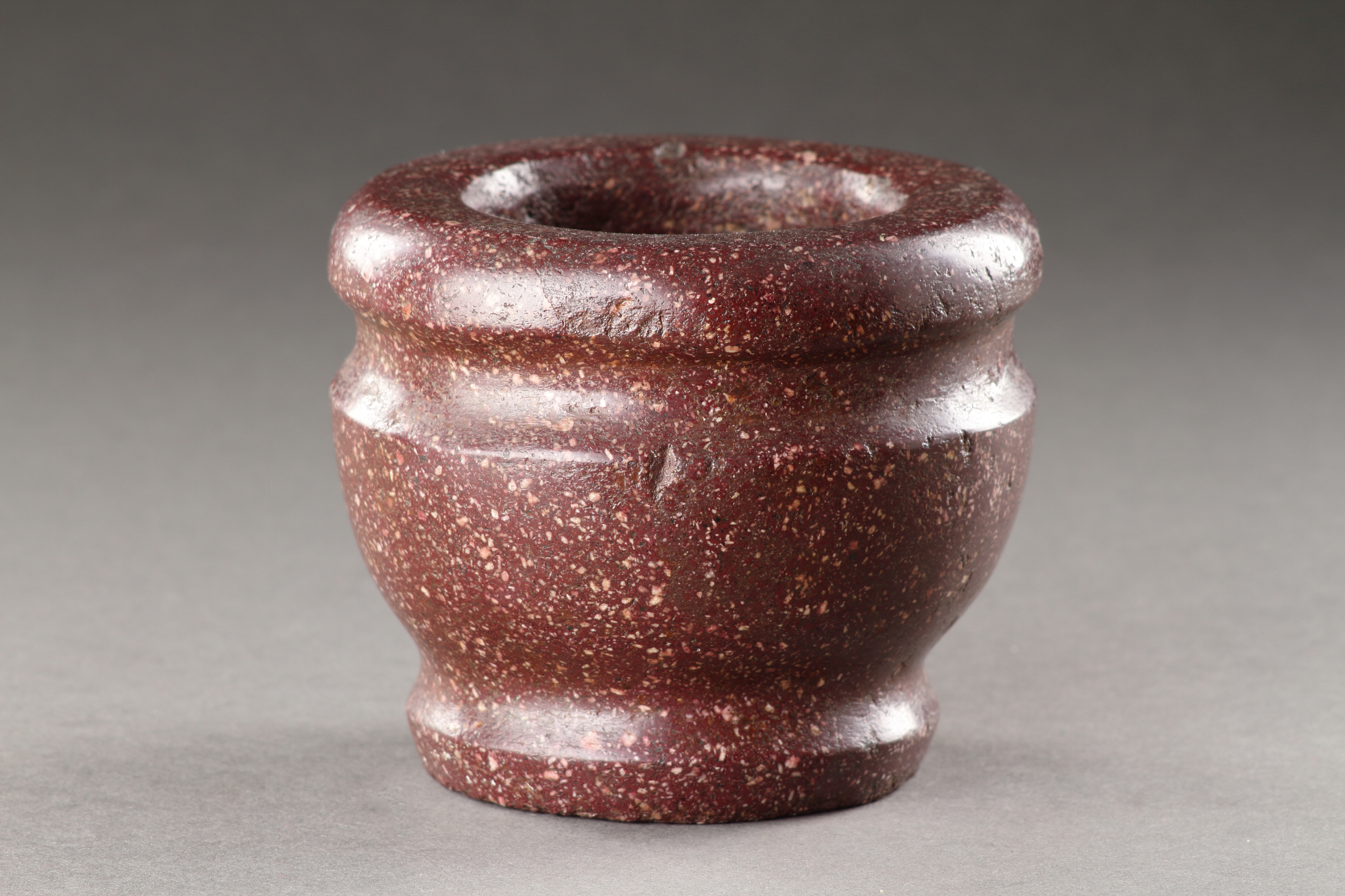 A Small Egyptian Porphyry Mortar 
